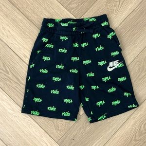 Nike Club all over logo print shorts- Medium